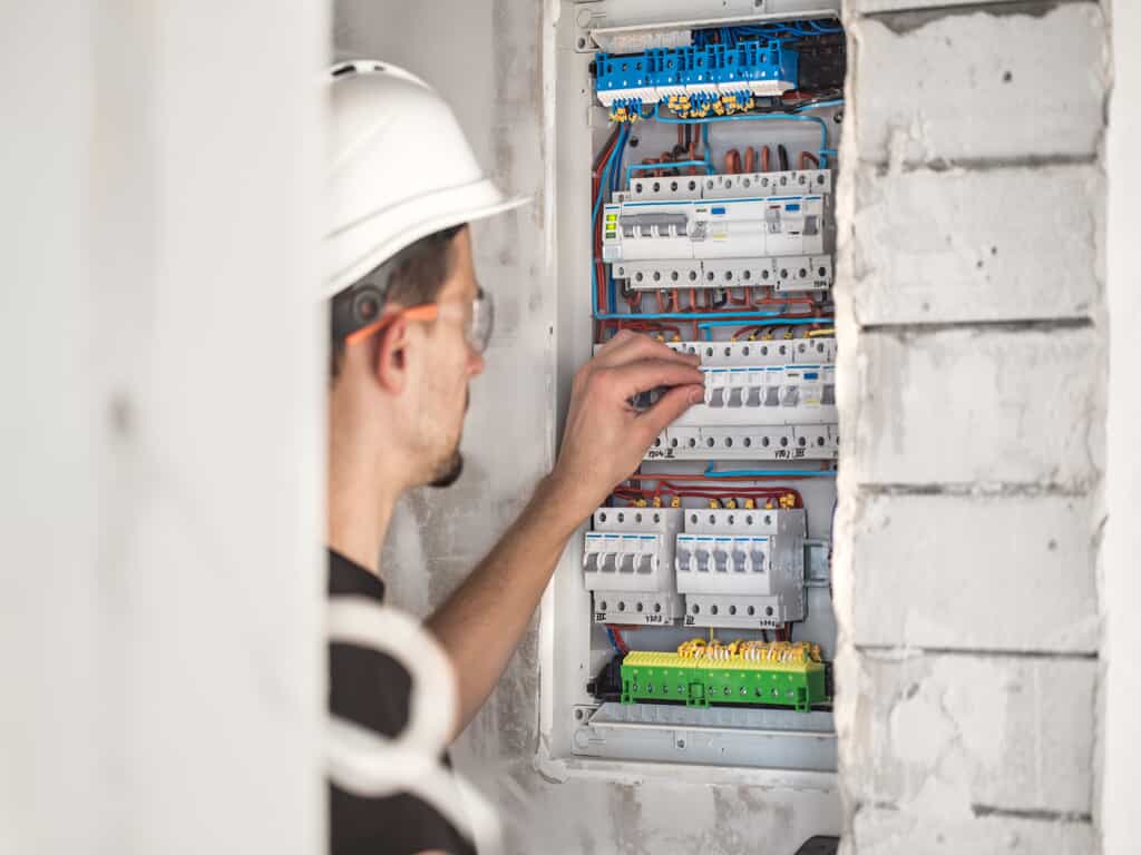Modern circuit breaker panel replacing old fuse box in Dallas home
